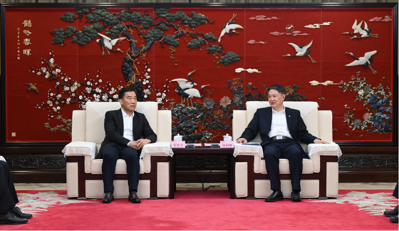 明阳集团董事长张传卫与中国华电集团董事长温枢刚在京会谈