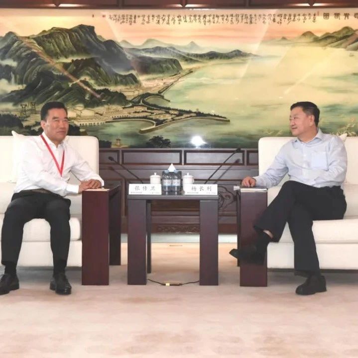 明阳智能董事长张传卫与中国广核集团董事长杨长利会谈